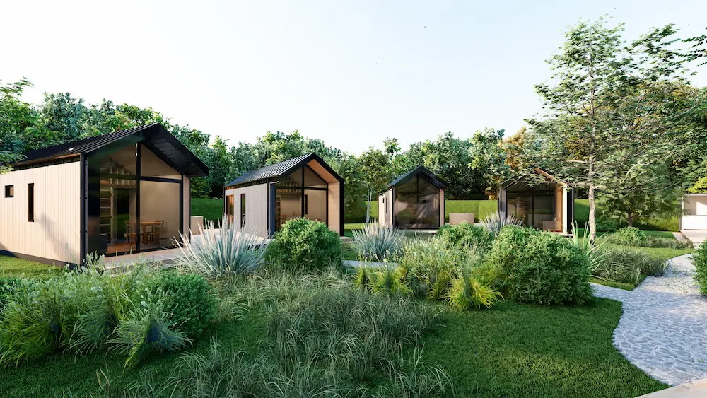 Render van een vakantiepark met kleine, moderne houten huisjes.
