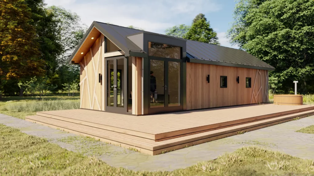 Lange houten vakantiewoning met terras, hottub en grijs dak.